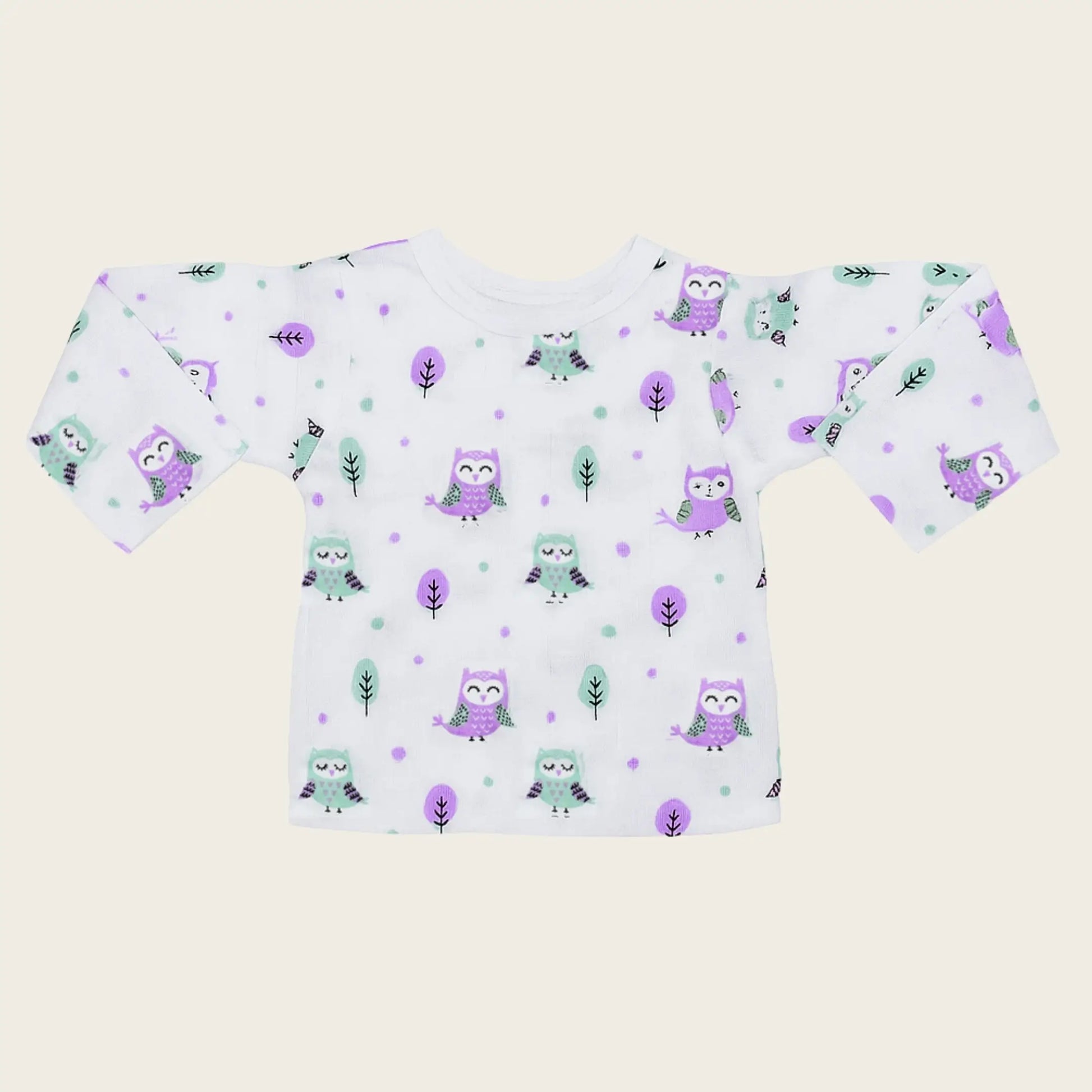 Children's outfit with owl pattern on a light background