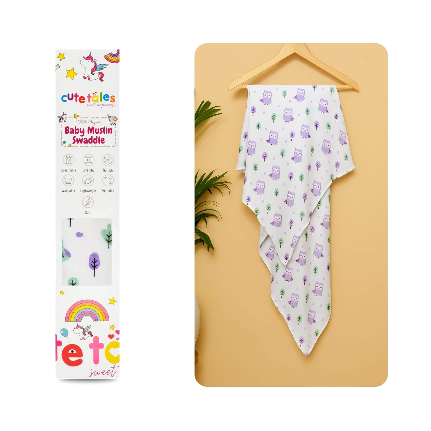 Baby muslin swaddle with owl pattern next to its packaging on a yellow surface