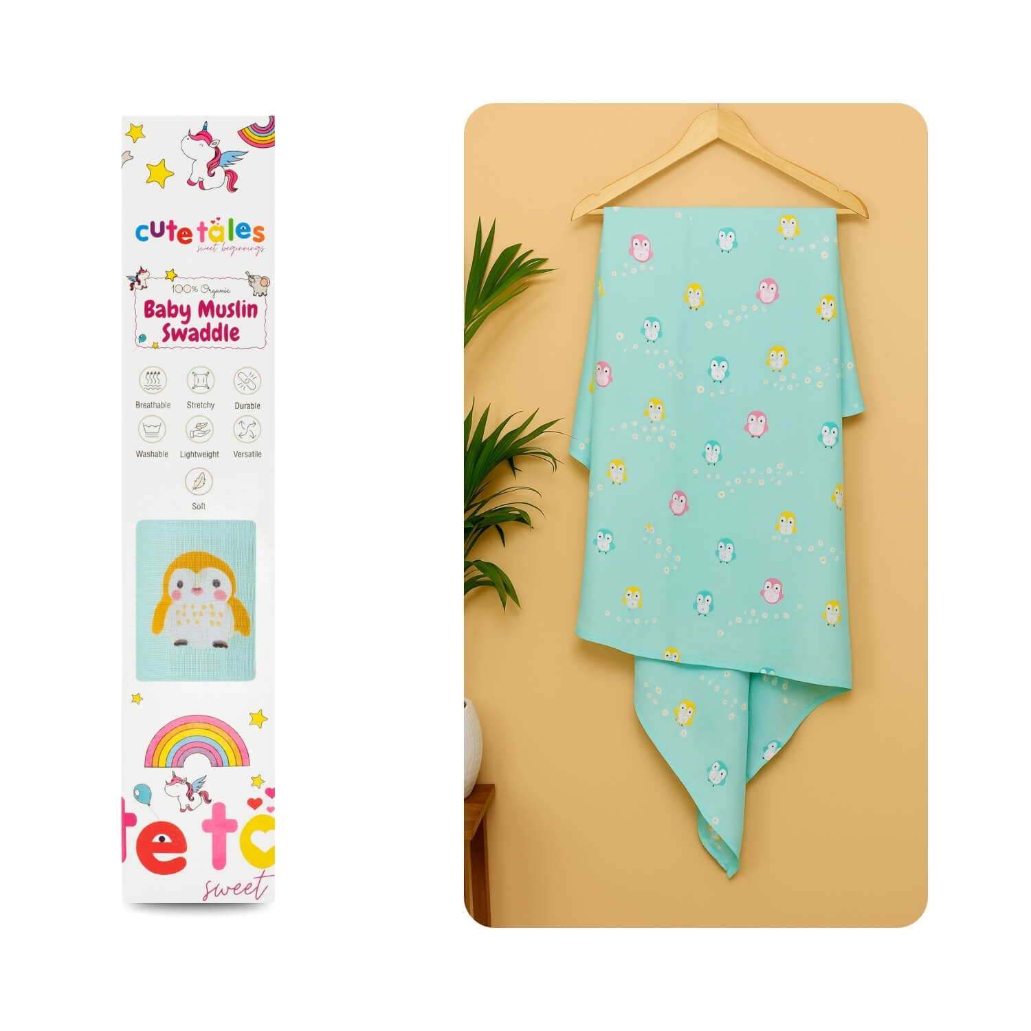Baby swaddle with cartoon designs on a yellow surface next to its packaging.