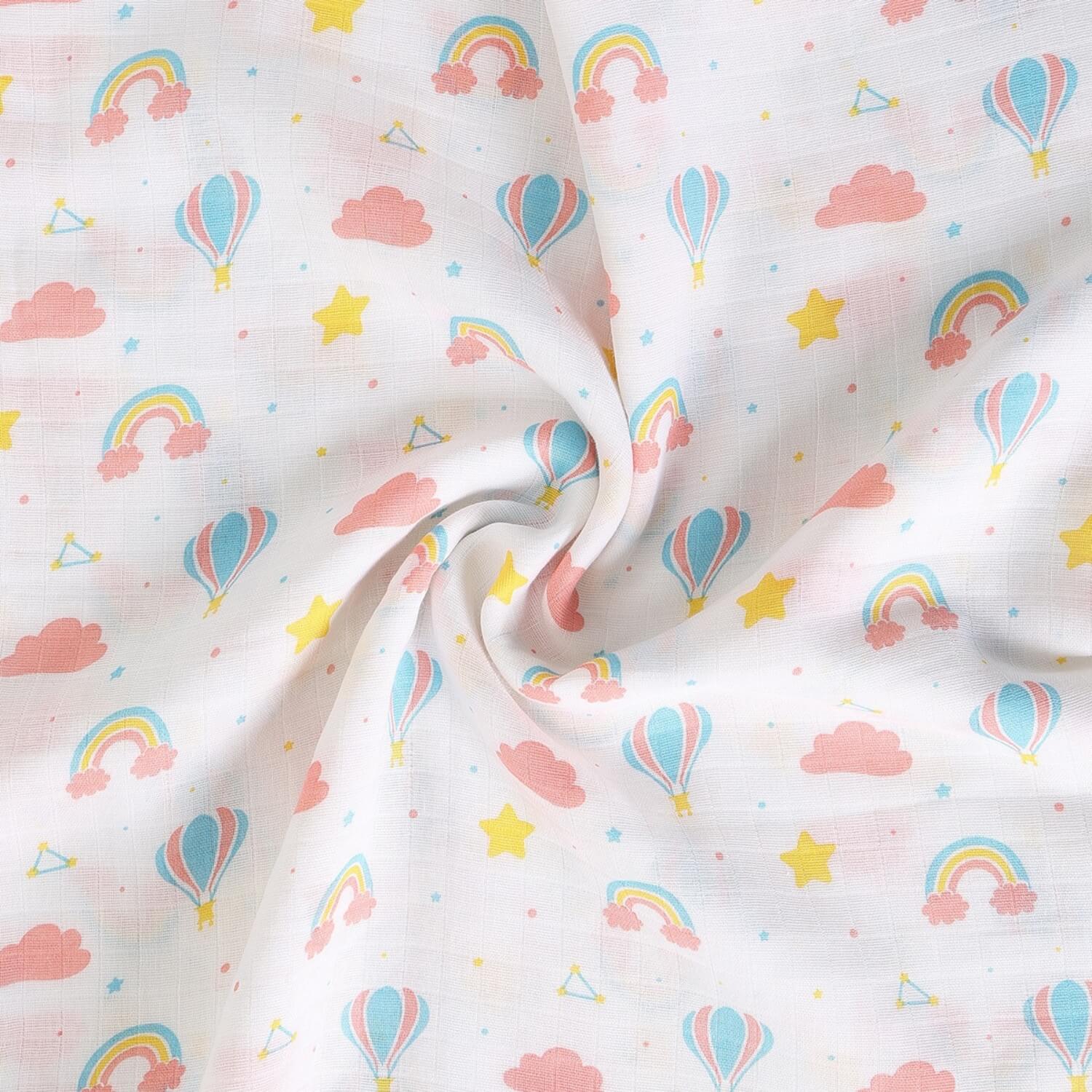 Cutetales Fabric with colorful rainbow, cloud, and hot air balloon pattern on a white background