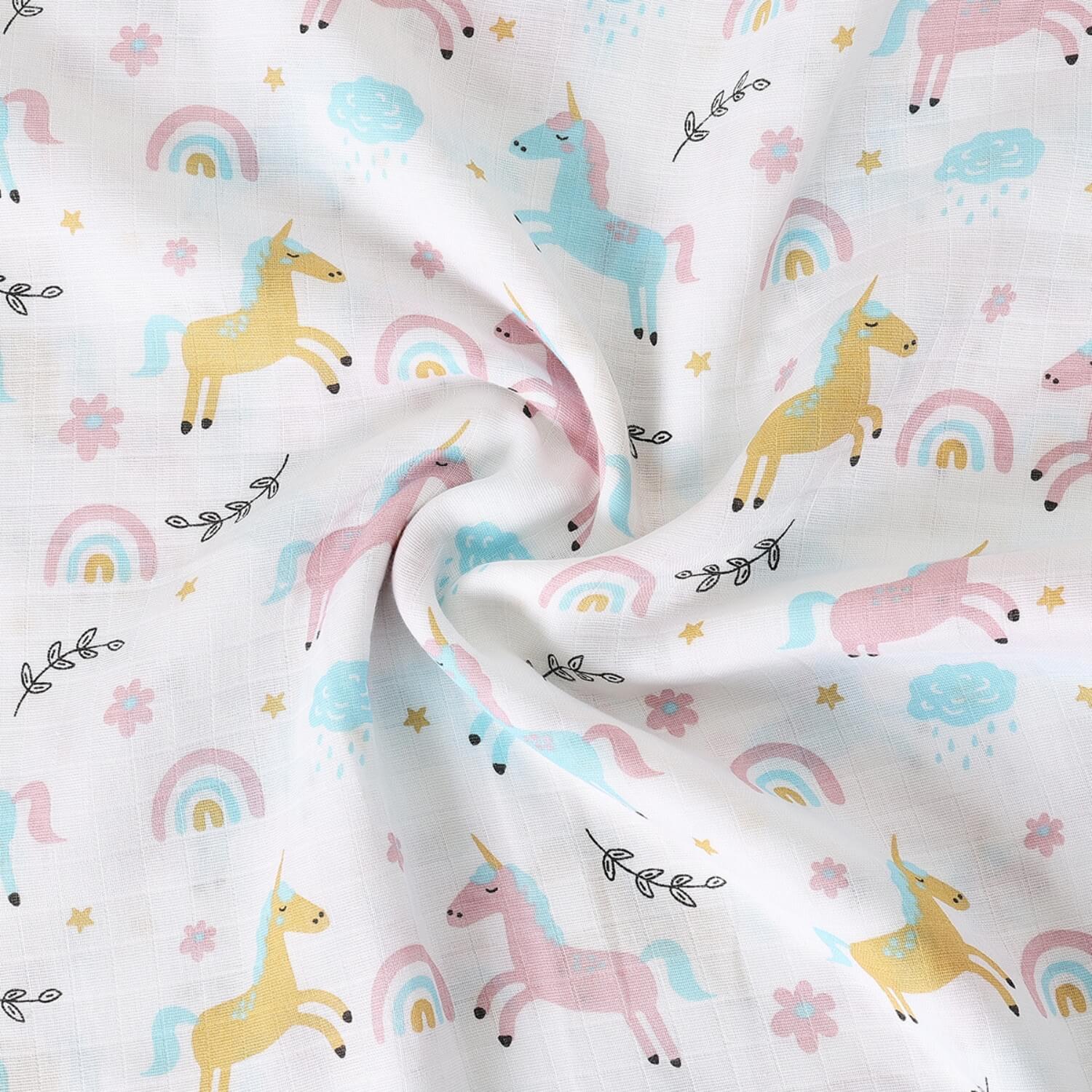 Cutetales Fabric with colorful unicorn and rainbow pattern on a white background